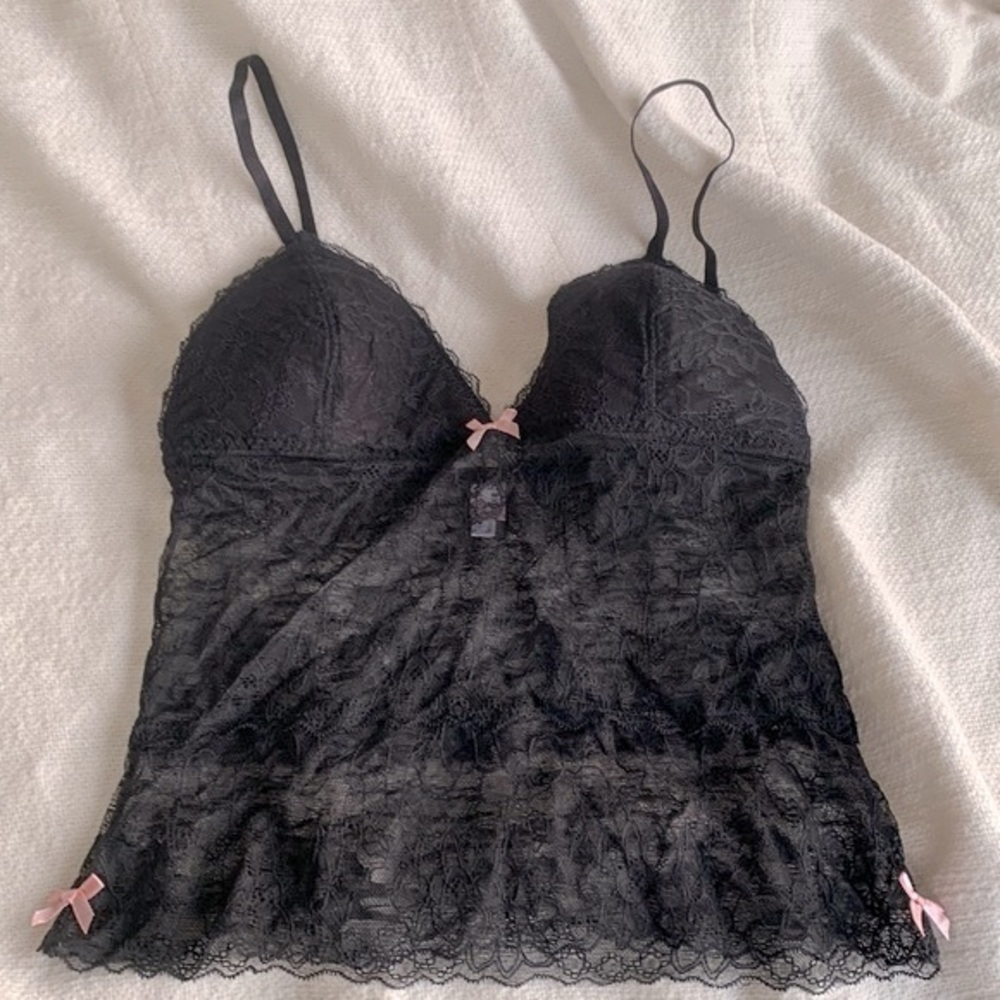 La lingerie black lace camisole with built in padded bra and pink bow trim